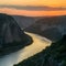 Sunset paints Danube Gorge in Djerdap, Serbia, with golden light