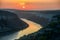 Sunset paints Danube Gorge in Djerdap, Serbia, with golden light