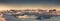 Sunset panorama of the Antarctica. Sepia tone.