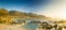 Sunset Panorama Of Camps Bay In South Africa