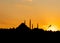 Sunset panorama of Istanbul at the golden hour, Sultan mosque visible as the sun goes down