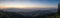 Sunset panorama landscape of mountains with forests