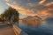 Sunset panorama of Lugano lake towards Parco Ciani and Mount Brie