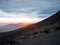 Sunset panorama of mountain range silhouette layers haze dust fog clouds at Misti volcano Arequipa Peru Andes