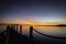 Sunset on a pier on Coron Island, Palawan, Philippines.