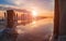 Sunset on a pink salt lake, a former mine for the extraction of pink salt. row of wooden pegs overgrown with salt