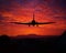 Sunset with a plane silhouette