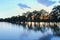 Sunset on pond with trees silhouette, long exposure, Czech lands