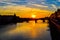 Sunset in Ponte alla Carraia alla Carraia Bridge through Arno