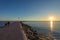 Sunset promenade with walking people at Marbella town, Andalusia, Spain