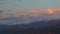 Sunset Purple-Pink Sky, Clouds Over The Mountains In The Distance. Copy Space. Timelapse.