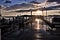 Sunset On Rain soaked pier,clouds