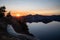 Sunset Rays Over the Mountains Behind Crater Lake from Garfield Peak