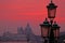 Sunset red and lanterns lit street in Venice, Italy