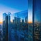 Sunset reflected off modern glass facades of Busy modern city life buildings in morning