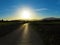 Sunset reflecting on lonesome country road