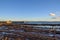 Sunset Reflecting off the harbour Walls of Old Saltcoats Pier on