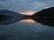 A sunset reflection at aoos lake, pindos national park