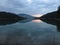 A sunset reflection at aoos lake, pindos national park