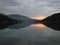 A sunset reflection at aoos lake, pindos national park