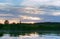 Sunset reflection in a small pond, dawn reflection in a swamp in the wild