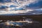 Sunset reflection in wetland landscape