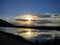 Sunset reflection in winter at Great Salt Lake, by the historic Saltair building, Panorama. The SaltAir, Saltair Resort, or Saltai