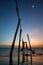 Sunset and reflections from the sea, decaying wooden bridges, Khao Pi Lai Phang Nga beach, Thailand