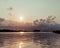 Sunset reflects on the Thu Bon River, Hoi An, Vietnam