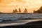 Sunset at Reynisdrangar cliffs on Black sand beach in Vik, Iceland