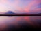 Sunset ripples, beautiful pink and purple sunset reflecting in shallow tide pool