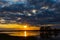 Sunset on the river with three trees on Desna river in springtime, Ukraine.