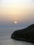 Sunset. Rock in Ionian sea