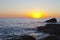 Sunset on the rocky shore. Tyrrhenian Sea