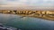 Sunset Rome aerial view in Ostia Lido beach over blue sea and brown sand beach, beautiful coast line and promenade a landmark of