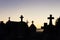 Sunset at Roussillon`s Cemetery with Mausoleums in Silhouette