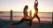 Sunset, runner or friends at beach stretching body in training, exercise or fitness workout in promenade. Warm up, women