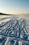 Sunset\\\'s Grace: Snowy Beach\\\'s Beaten Path in Golden Hour. Garciema Pludmale, Latvija