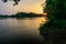 Sunset\\\'s Warm Glow on a Calm Lake