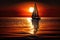 sunset sailboat gliding on calm waters, with the sun casting a warm glow