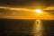 Sunset Sailboat silhouetted on ocean