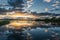 Sunset on salt meadows near Cap Ferret on the Arcachon Bay, France