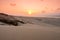 Sunset on sand dunes in Chaves beach Praia de Chaves in Boavist