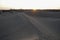 Sunset in the sand dunes of the Maspalomas Desert, Gran Canaria, Spain.