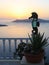 Sunset at Santorini. Seahorse sculpture at house terrace. Santorini caldera, Greece.Europe. Aegean sea.