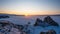 Sunset scene at cape of Burkhan with frozen ice Lake Landscape