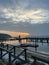 Sunset scene over Baltic sea with empty harbor