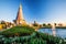 Sunset scenery landscape of two pagodas with tropical garden, tourists relaxing around two pagodas, beautiful mountain and light