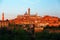 Sunset scenery of Siena, a beautiful medieval town on a hilltop in Tuscany Italy, with a view of architectural landmarks, Mangia T