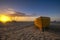 Sunset on the sea beach, boats on the sand